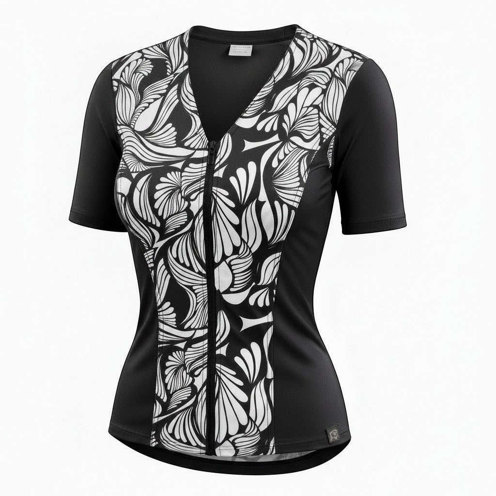 Covertogs Swimwear slimline V-neck tankini top in black and white stencil print with elbow sleeves and front zip.